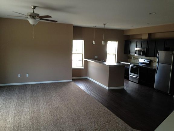 Open floor plan kitchen, dining and living room combination