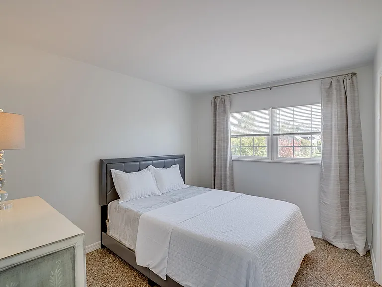 Furnished bedroom #1 with access to completely remodeled Jack & Jill bath