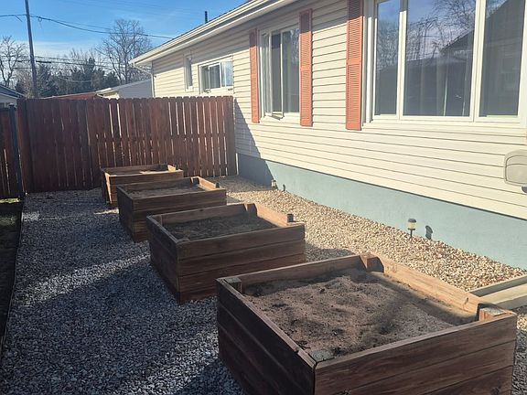 Front garden area with 4 garden beds and extra room to expand.
