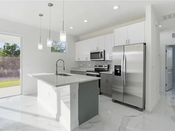 406 Genoa AVE S, LEHIGH ACRES, FL 33974