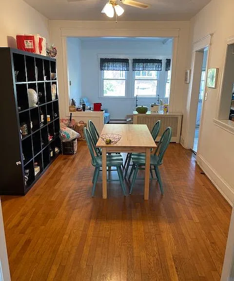 Dining room comes with table, chairs, large storage unit.