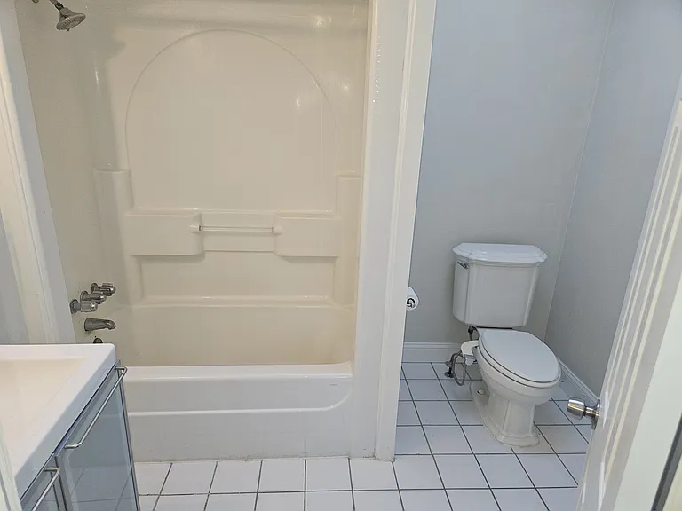 Large bathroom with tub and shower