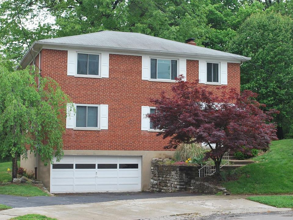 Front of the two family with 2 car garage