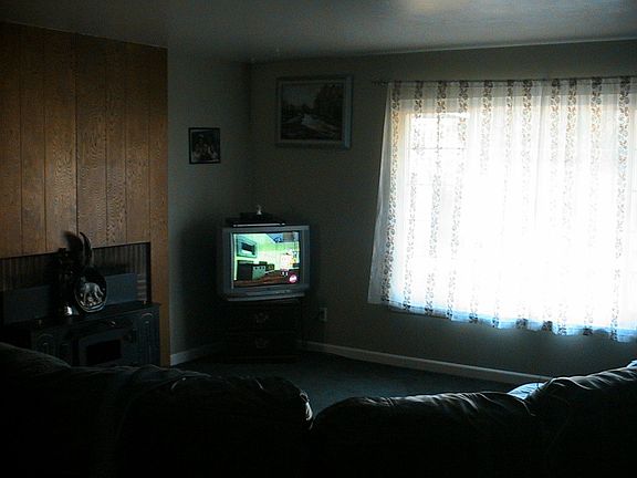 Large living room window to check on the pool party