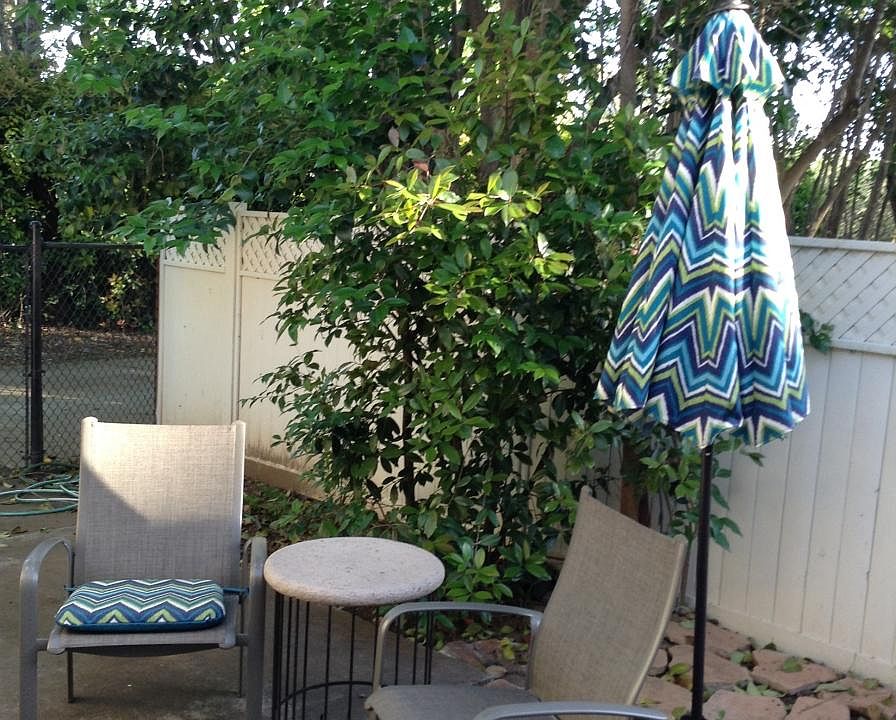 Private fenced patio with BBQ