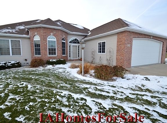 Front of House - Professionally landscaped yard.