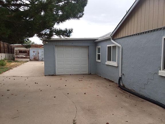 Attached One car with oversized shop Rear garage not included