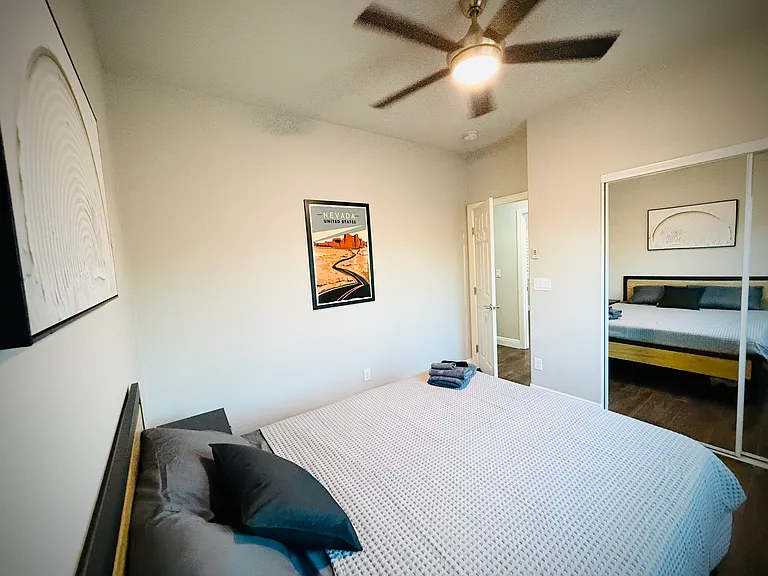 2nd floor standard bedroom 10x10' with queen bed & new memory foam mattress. Mirrored closets with lots of space.