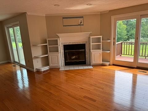 Main Floor Living Room with built ins and exterior porch