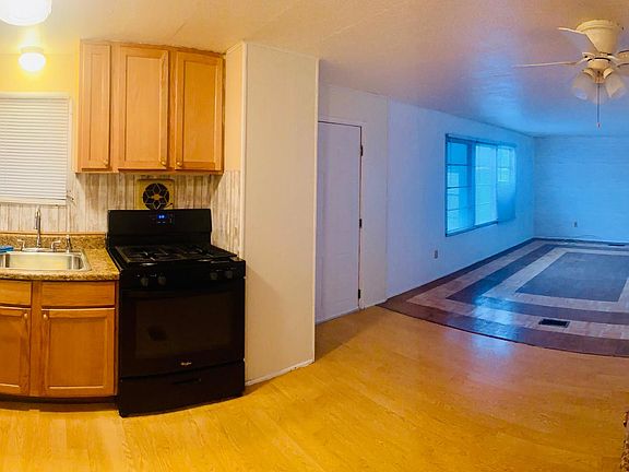 Kitchen/ dining combo leading to the living room