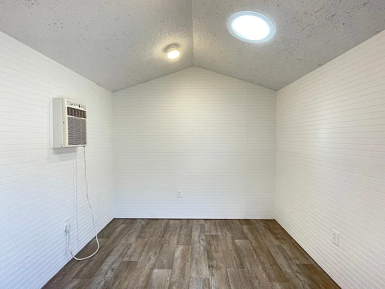 Shed/extra space conversion.
A/C, lights, small skylight, power.