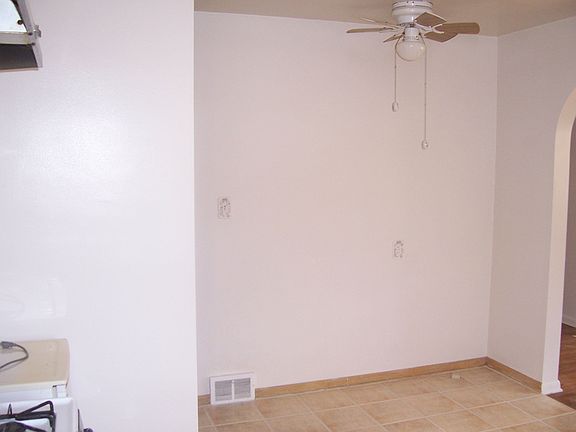 eat in kitchen with ceiling fan