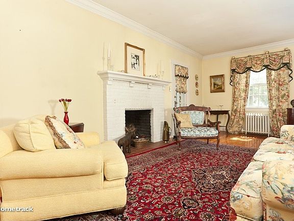 Beautiful living room with wood burning fireplace
