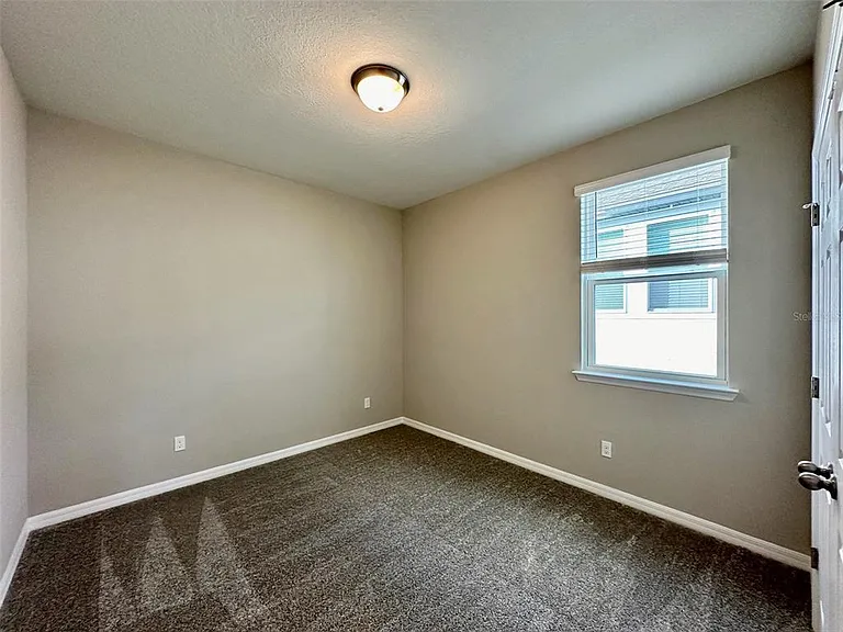 4869 Lacewing Dr — Photo 14