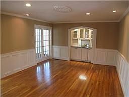 Formal Dining Room or Family Room with gleaming hardwood floors. 