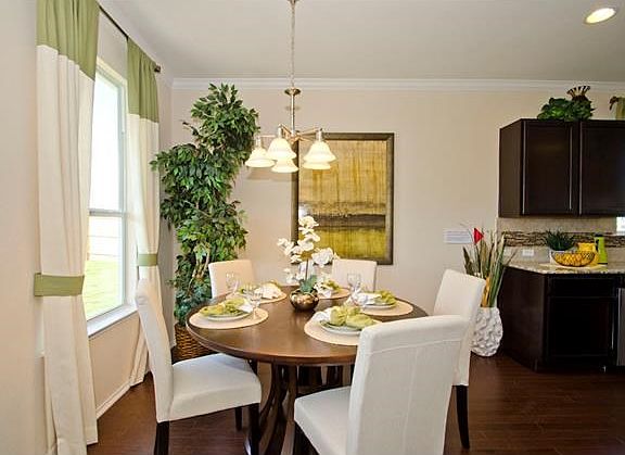 Photo of Model Home with Same Floor Plan, Not of Actual Home Listed