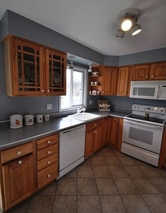 Kitchen ceramic tile floor all appliances stay