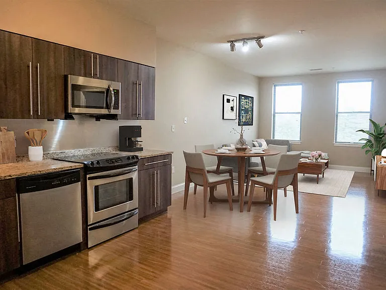 Apartment sunlit by large windows