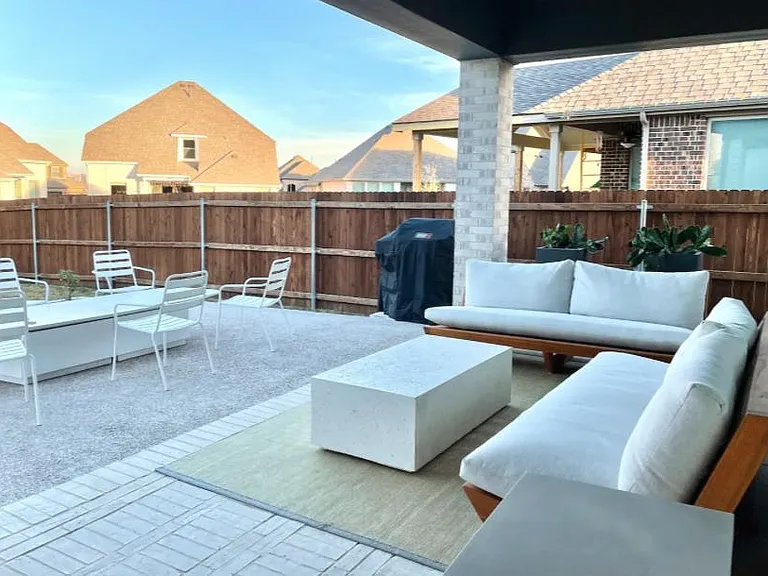 Backyard with plenty of sitting area and BBQ Grill
