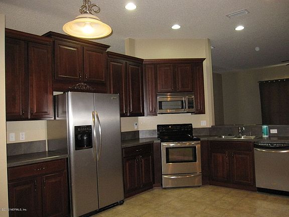 5th image of 9560 Woodstone Mill Dr