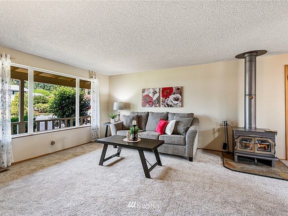 Double-pane windows & wood stove will keep the heat in when you need it most.