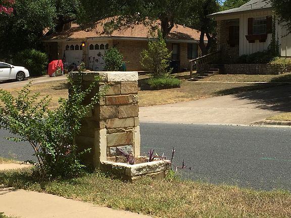 Stone Mailbox with Flowers