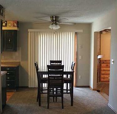 DINING AREA IS OPEN TO KITCHEN, LIVING ROOM & FAMILY ROOM