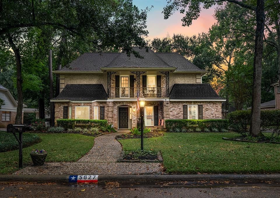 Welcome home! Beautiful night time view of this updated French style home with balcony. Home offers great space with both formals, large living area, home office, kitchen, and breakfast area. Large primary bed and bath all downstairs.