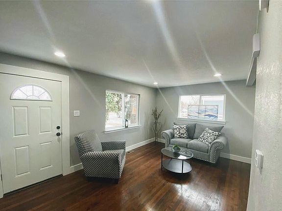 New quiet storm windows in living room (blinds will be installed).