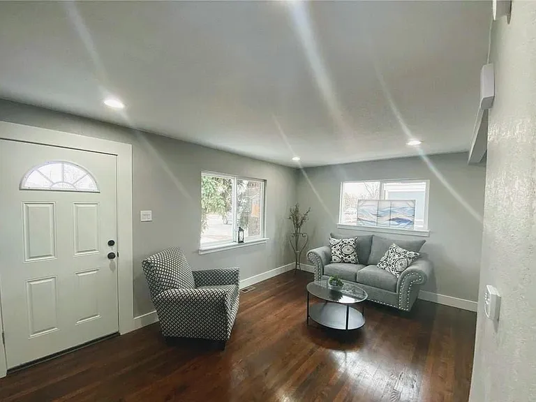 New quiet storm windows in living room (blinds will be installed).