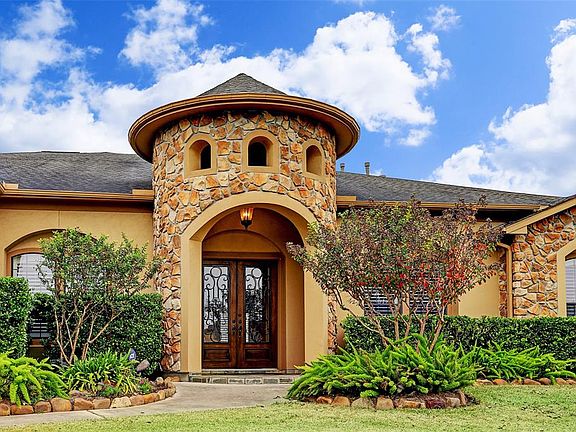 An architectural masterpiece that includes natural elements of stone are just a few highlights of this home!