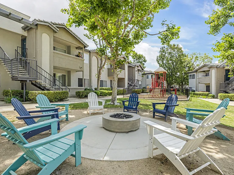 The Summit's communal grass area is the perfect gathering spot, featuring a cozy fire pit surrounded by plenty of seatingideal for relaxing evenings and good conversation under the stars.