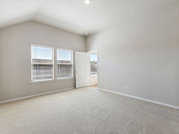 Primary Suite in the Diamond home plan by Trophy Signature Homes - REPRESENTATIVE PHOTO