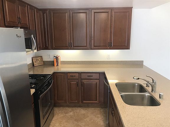Stainless appliance package and recessed lighting.
