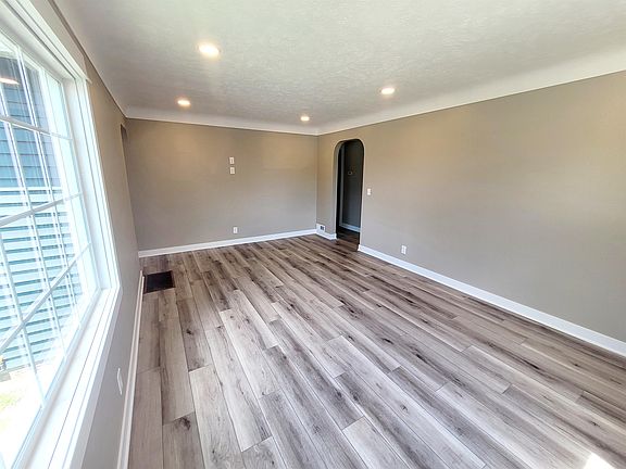 Living room with front entry
