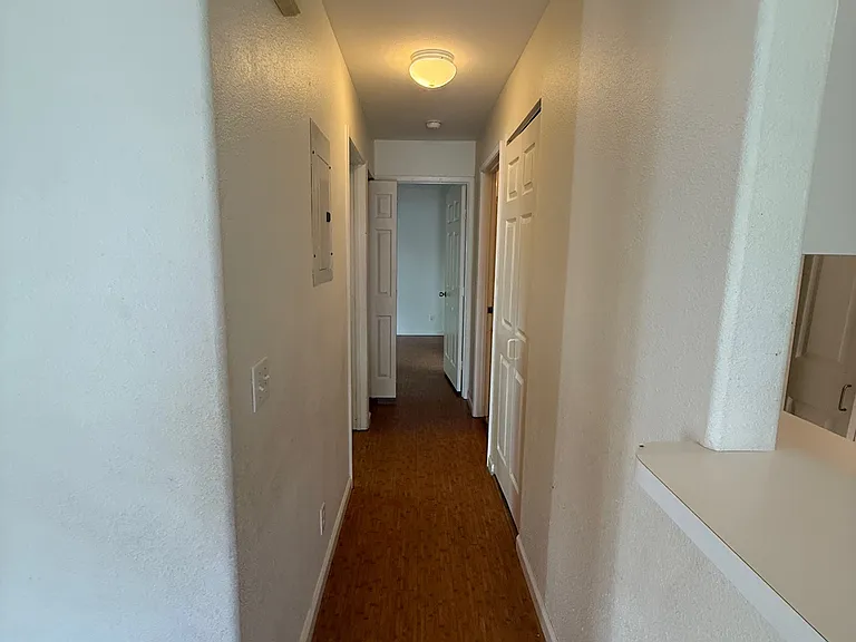 Hallway to bedrooms / bathrooms / laundry closet
