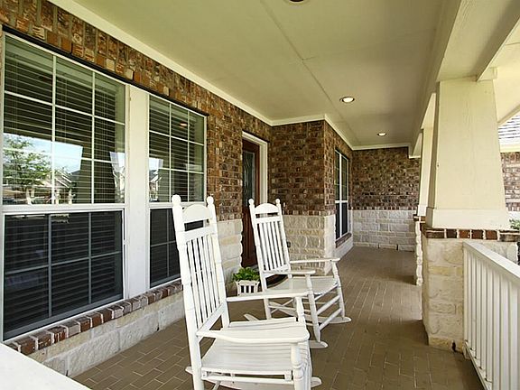 Adorable covered front porch for enjoyment on nice summer days.