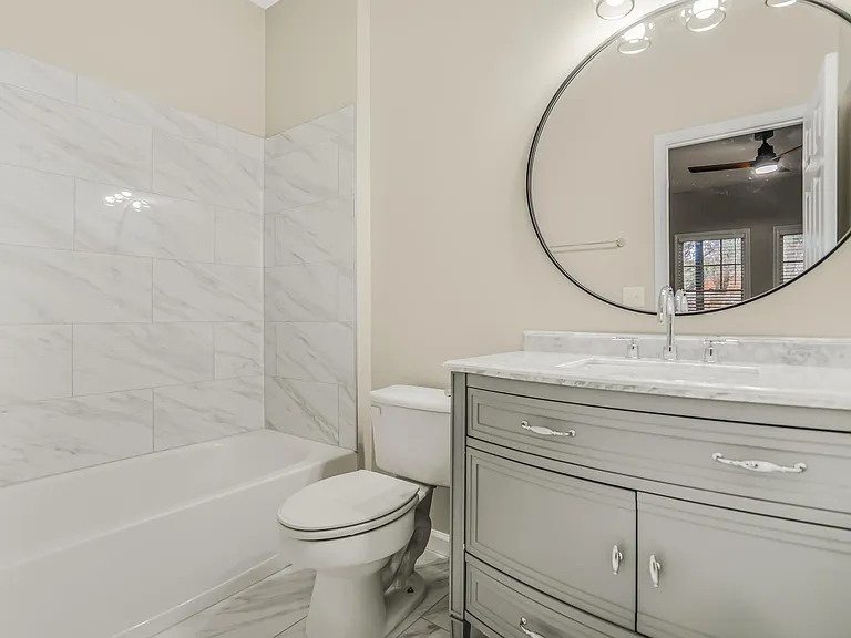 Third Bedroom suite with top of the line Italian tiles and new vanity