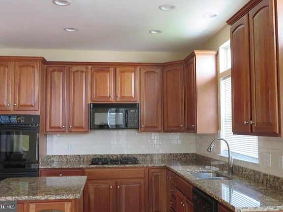 3rd image of 9888 E Hill Dr