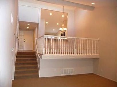 Living room to dining area and kitchen