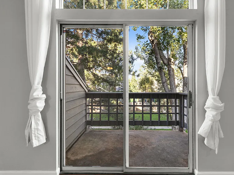 Private balcony large enough to accommodate patio chairs, a bistro table, and plants - perfect for creating your own sanctuary and enjoying the outdoors throughout the day.