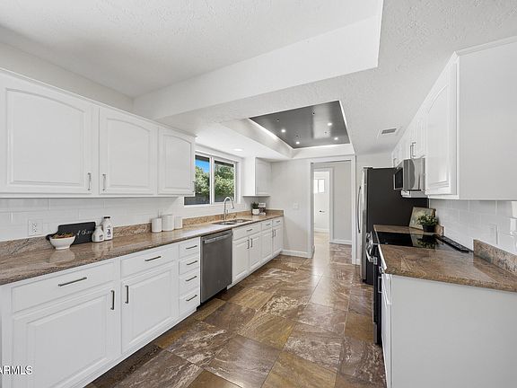 3rd image of 5610 E CHARTER OAK Road
