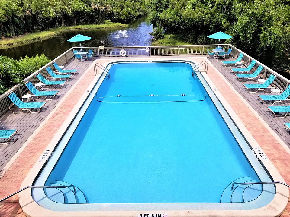 Heated community pool located close to this unit.