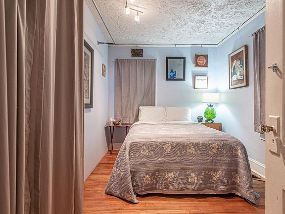 one guest bedroom is off the living room