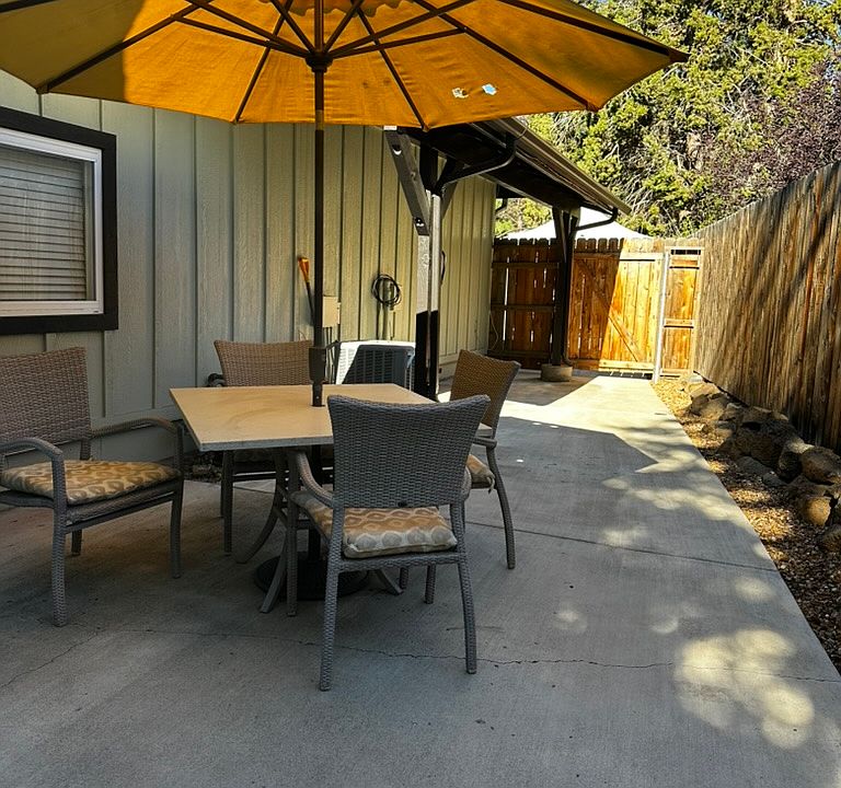 Enclosed outdoor area. Screened door doggie door leads to this secure area.