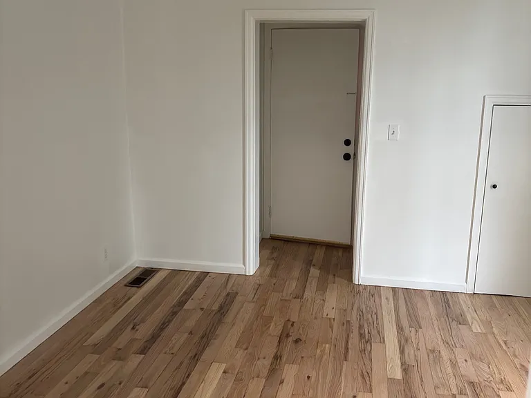Living room with freshly refinished hrdwd floors