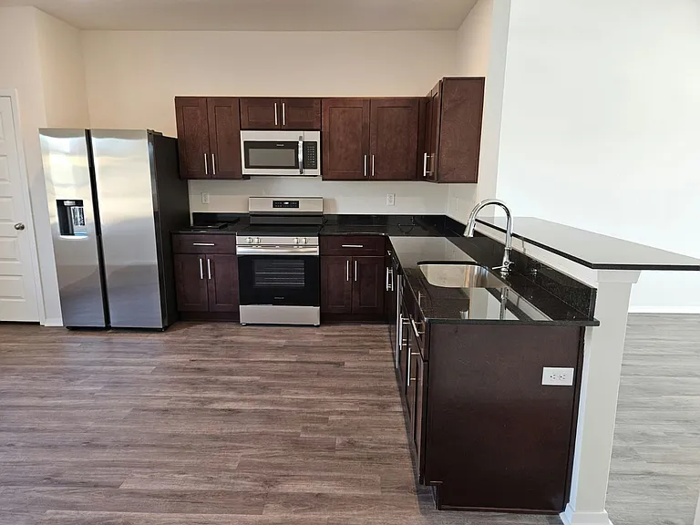 2417 E War Eagle St — Photo 3