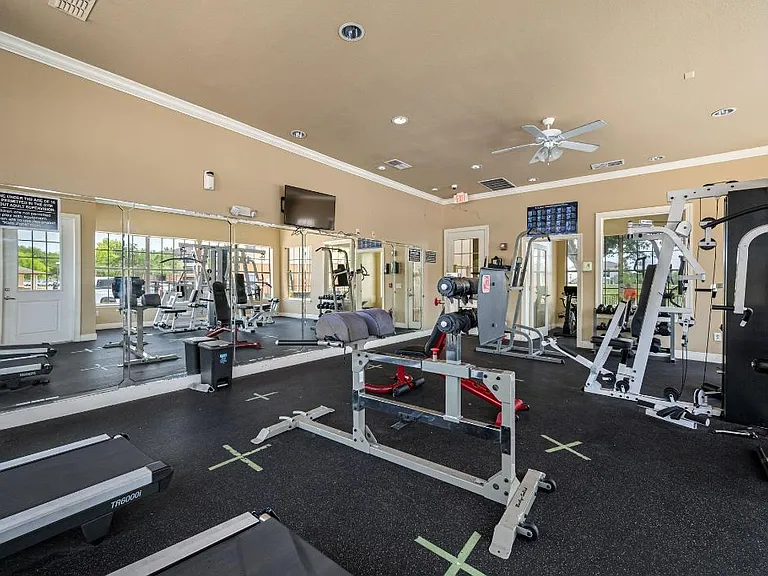 A modern, fully equipped gym featuring cardio machines, free weights, and strength-training equipment. Ideal for all fitness levels, with a clean, air-conditioned space for workouts anytime.