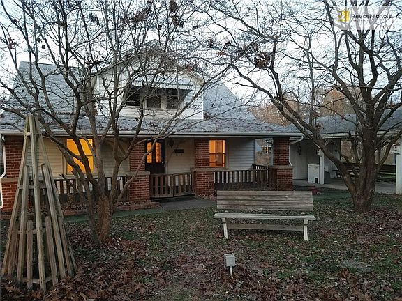 Front elevation including carport