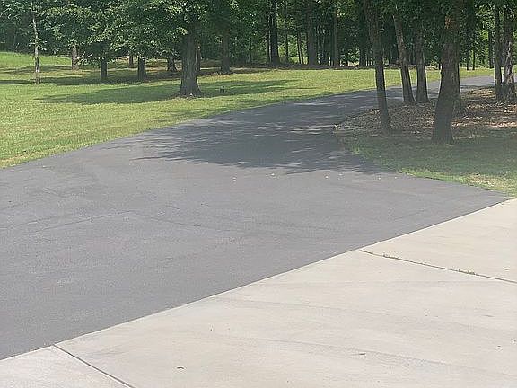 Asphalt driveway & Concrete